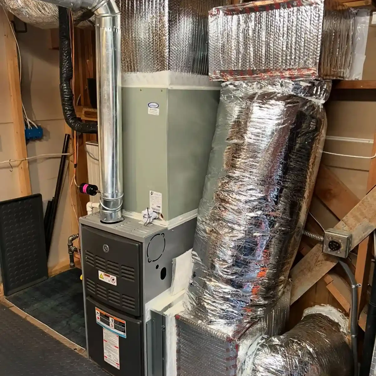 Complex heating system installation, with sealed ductwork.