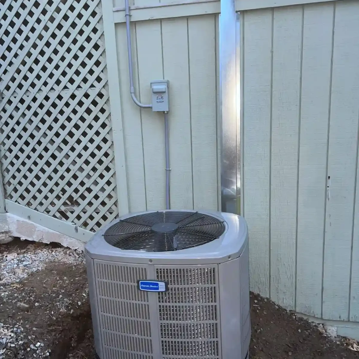 Outdoor air conditioning system connected to a home.