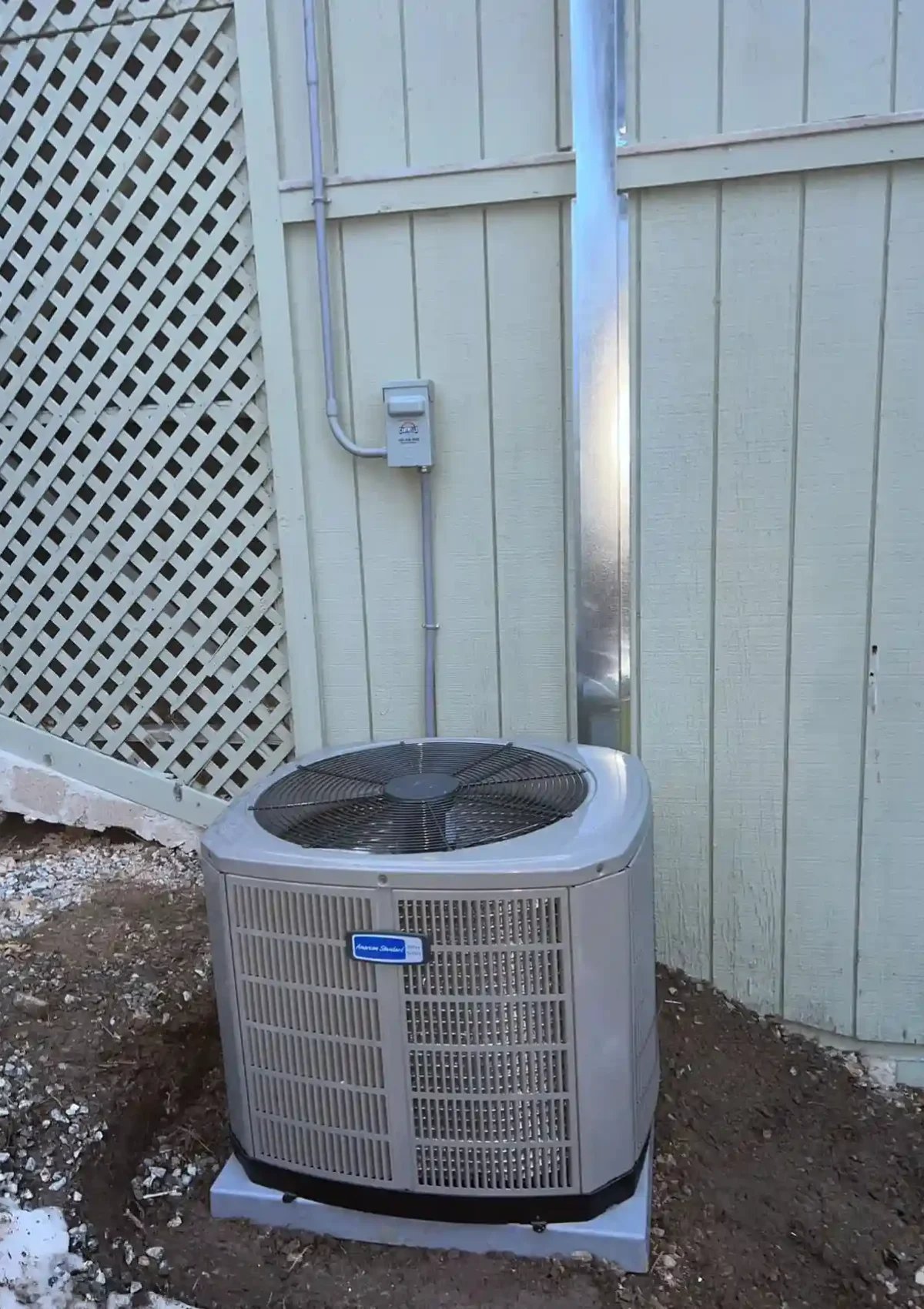 Outdoor air conditioning system connected to a home.